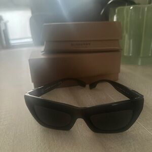 Burberry Black Sunglasses Sleek and Sporty Wraparound Style